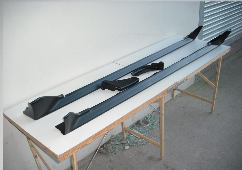 Toyota AE86 Levin / UK Corolla GT OEM UK spec black skirts inc separate front cap